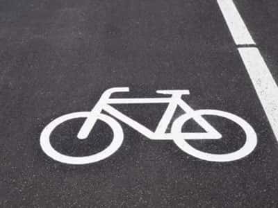 A cycle path painted on the side of the road.