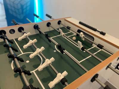A picture of a table soccer in a room.