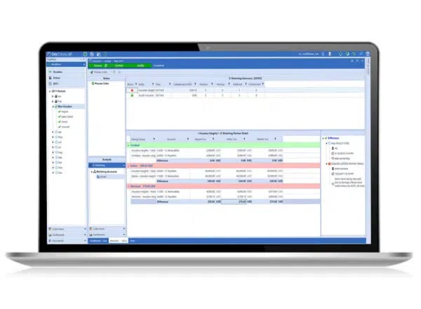 A laptop with a screen displaying a spreadsheet.